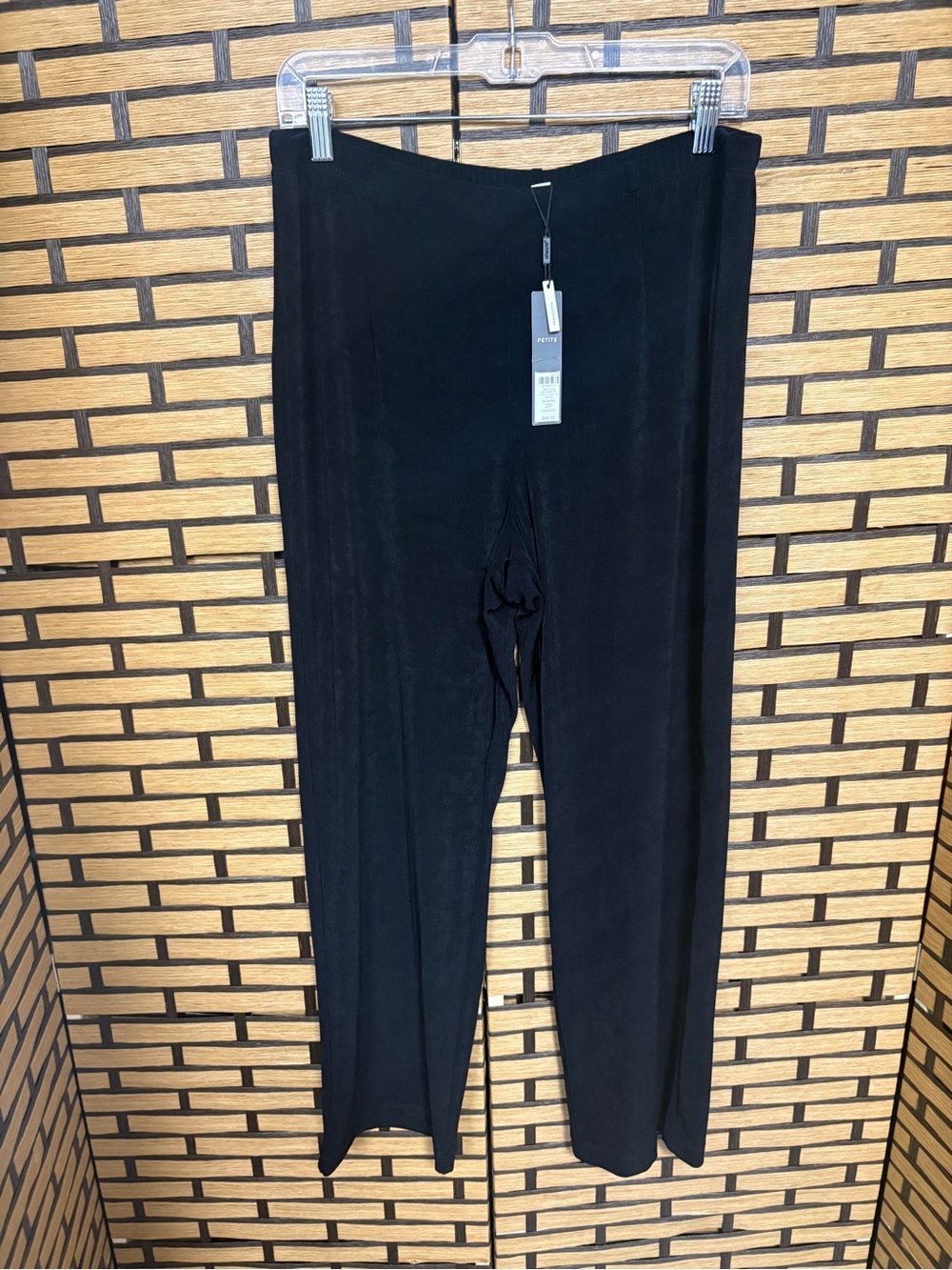 Chico’s traveler black pull on pants size 2P (large)